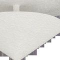 Close-up of textured cone-shaped bottom feature of white flush mount ceiling light