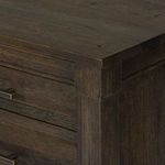 Close-up of top corner showing precise joinery and weathered chestnut wood finish