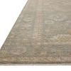 Close-up angled view of Louisa Lagoon rug edge showing texture and finished border