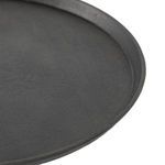 Angled close-up of iron tray top showing edge and textured finish