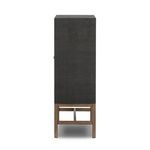 Side profile of Fiona Bar Cabinet showing slim depth and continuous woven raffia finish