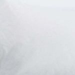 Close-up texture of the white linen and cashmere blend fabric on the sham