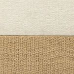 close-up showing woven natural hyacinth wicker texture and beige fabric seam meeting