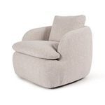 Detailed view of cushion overlapping rounded base corner showing textured fabric