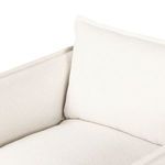 Close-up of front left corner and stitching detail on Andre Outdoor Swivel Chair slipcover
