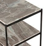 Angled back view of nightstand showing slender vertical iron supports and marble tiers