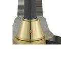 Close-up of brass finish base with on/off switch lit red on textured gray shaft