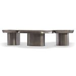 Side profile of three Clawson cocktail tables connected in a row showing interplay of shapes and shadows