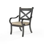 Angle view of Monterey Dining Chair focusing on armrest curve and cushion thickness