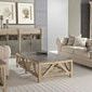 End table styled in a light, elegant living room setting with matching furniture pieces