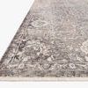 Side angle view showing fringe detail and texture of the Homage Stone Ivory Rug