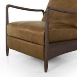 Rear view of olive green leather recliner showing vertical leather seams and wood frame