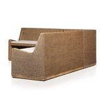 Close-up showing tufted beige fabric cushion detail on corner seat section of banquette