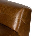 Detailed close-up of the slight crease and natural creasing on the leather backrest