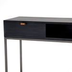 Open drawers viewed from front and side showing contrasting natural wood interiors and black exterior