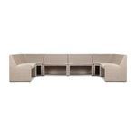 U-shaped vintage white outdoor dining banquette with rattan frame and fabric seat cushions