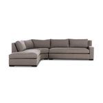 Front-facing view showing full length of sectional with chaise extending from left side