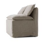 Side profile with deep seat and loose cushions angled backward