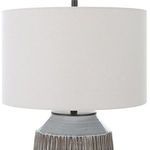 Close-up of oatmeal linen hardback drum shade with visible natural slubbing texture