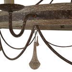 Close-up of elongated drop bead hanging from metal scalloped rods under chandelier wooden ring