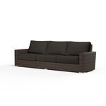Montecito Sofa with cognac multi-colored resin wicker frame and dark brown seat and back cushions