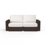 Front view focusing on clean lines and symmetrical cream seat and back cushions