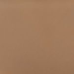 Close-up of leather seat texture in warm tan color