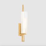 Vineland Sconce mounted on light gray background with soft illumination through cloud glass shade
