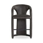 Front view showing symmetrical curved backrest and padded seat with black metal footrest