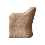 Side profile with focus on thick armrest and curved back of woven natural fiber chair