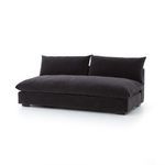 Side view of Grant armless sectional piece showing plush seat cushion and back support pillows in charcoal fabric