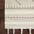 Sawyer Silver Rug corner on wood floor highlighting woven texture and braided accents