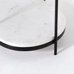 Side back angle showing consistent oval shape and slim framing of Felix Oval Nightstand