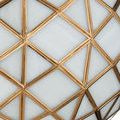 Polyhedron Pendant side angle showing round top brass cap and chain link suspension