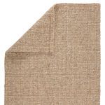 Corner of Oceana rug folded revealing both top weave and underside stitching