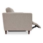 Profile view of sofa showing bouclé fabric texture and extended footrest