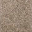 Chunky wool area rug with raised Turkish-inspired geometric pattern in neutral stone tones