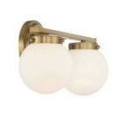 Angled shot highlighting the natural brass finish and smooth globe surfaces