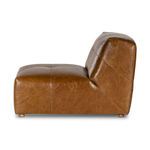 Side view with focus on the gentle incline of the backrest and seamless leather upholstery