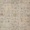 Full top view showing symmetrical ornate pattern in muted ivory and beige with subtle blue and brown accents