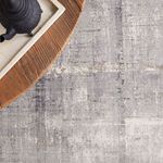 Close-up of Lavato rug surface texture with part of wooden table and tray visible