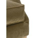 Side hem detail on armrest showing smooth olive velvet fabric on Marleigh chair
