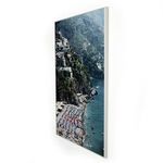 Side angle revealing depth and thin profile of float-mounted Positano beach aluminum photo print