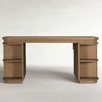 Blonde natural mindi wood desk with rattan panels and antique bronze hardware, featuring open side shelves