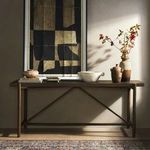 Close-up showing close grain texture and warm brown finish on wood surface