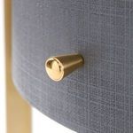 Close-up of brushed brass knob on drawer front of Bodrum side table