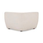 Back angle view emphasizing rounded rear and seamless fabric on Amelia Modular Sectional corner chair