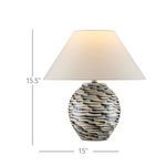 Detailed look at the ceramic base pattern featuring flowing, streaking blue brush strokes over a crackled beige finish