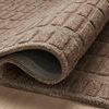 Rolled edge detail showing the thickness and backing of the Bradley Cocoa wool rug