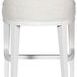 Back view of Cove Stool highlighting the clean lines and white wood frame with subtle seam details on upholstery